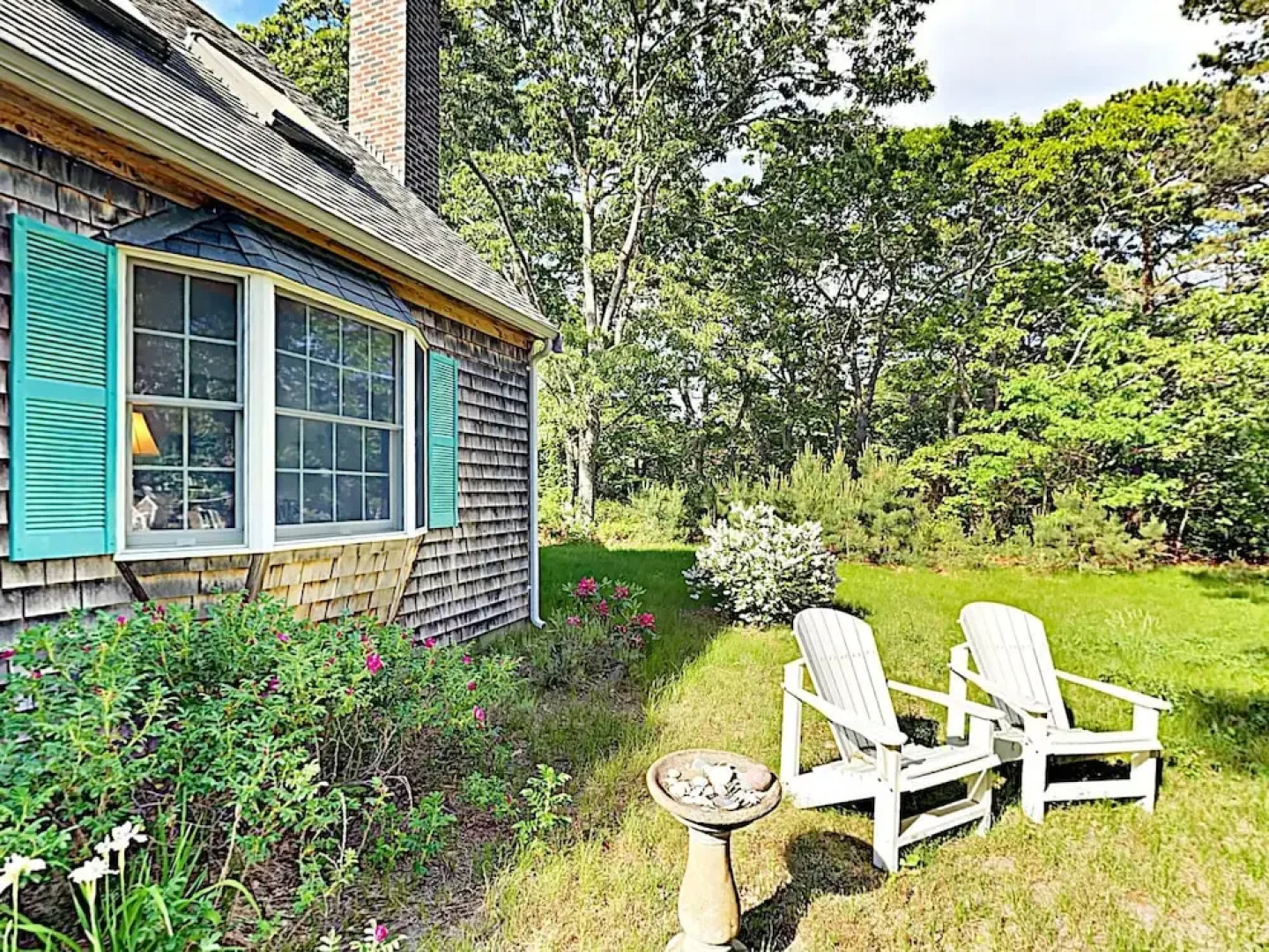 Woodsy Cape Cod Home by RedAwning