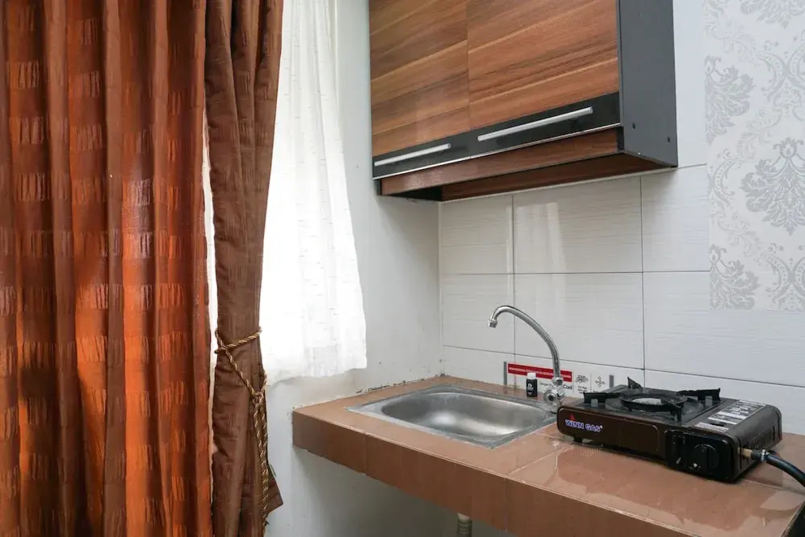 Elegant Design Studio Apartment at Margonda Residence 4 By Travelio