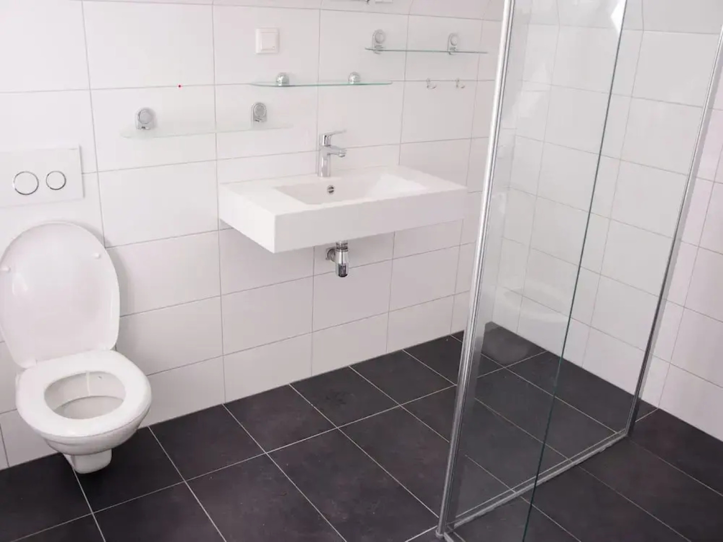 Characteristic house with a garden, surrounded by forest