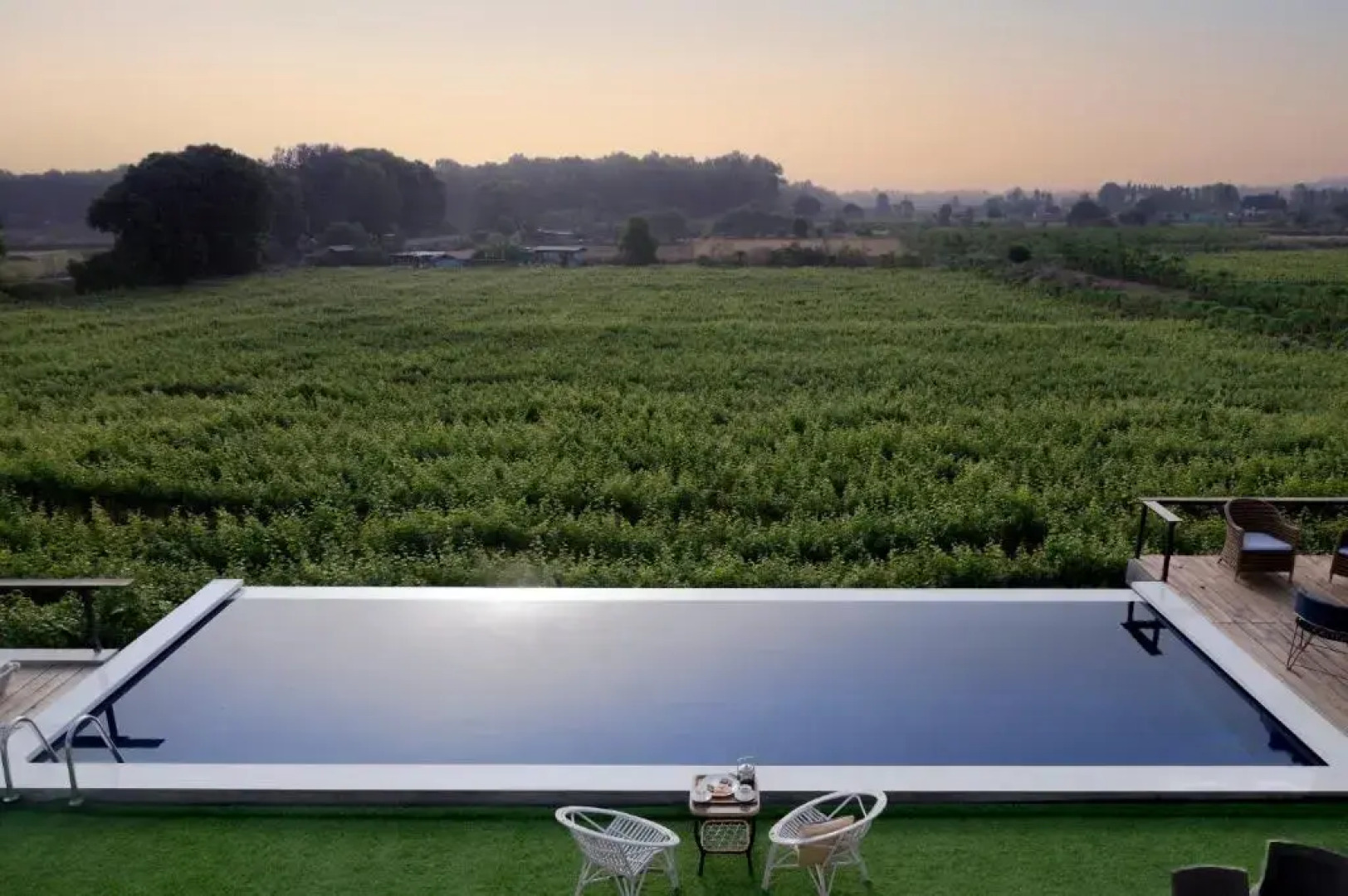 SaffronStays Onellaa, Nashik - infinity pool villa surrounded by a vineyard