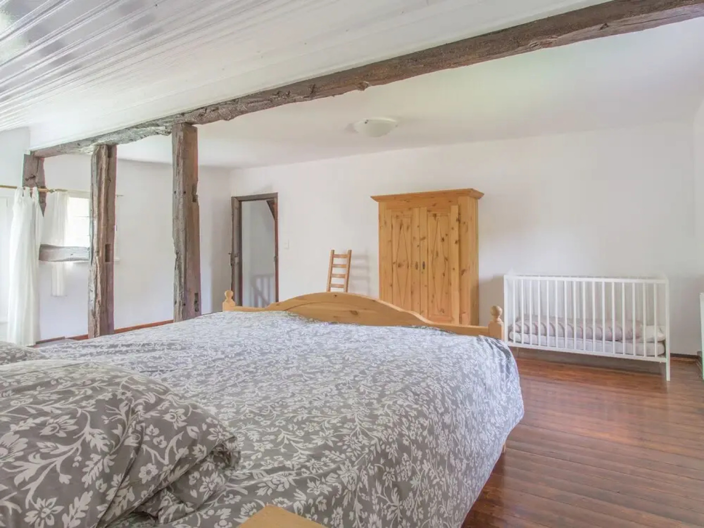 A Lovely Watermill Surrounded by Delightful Greenery