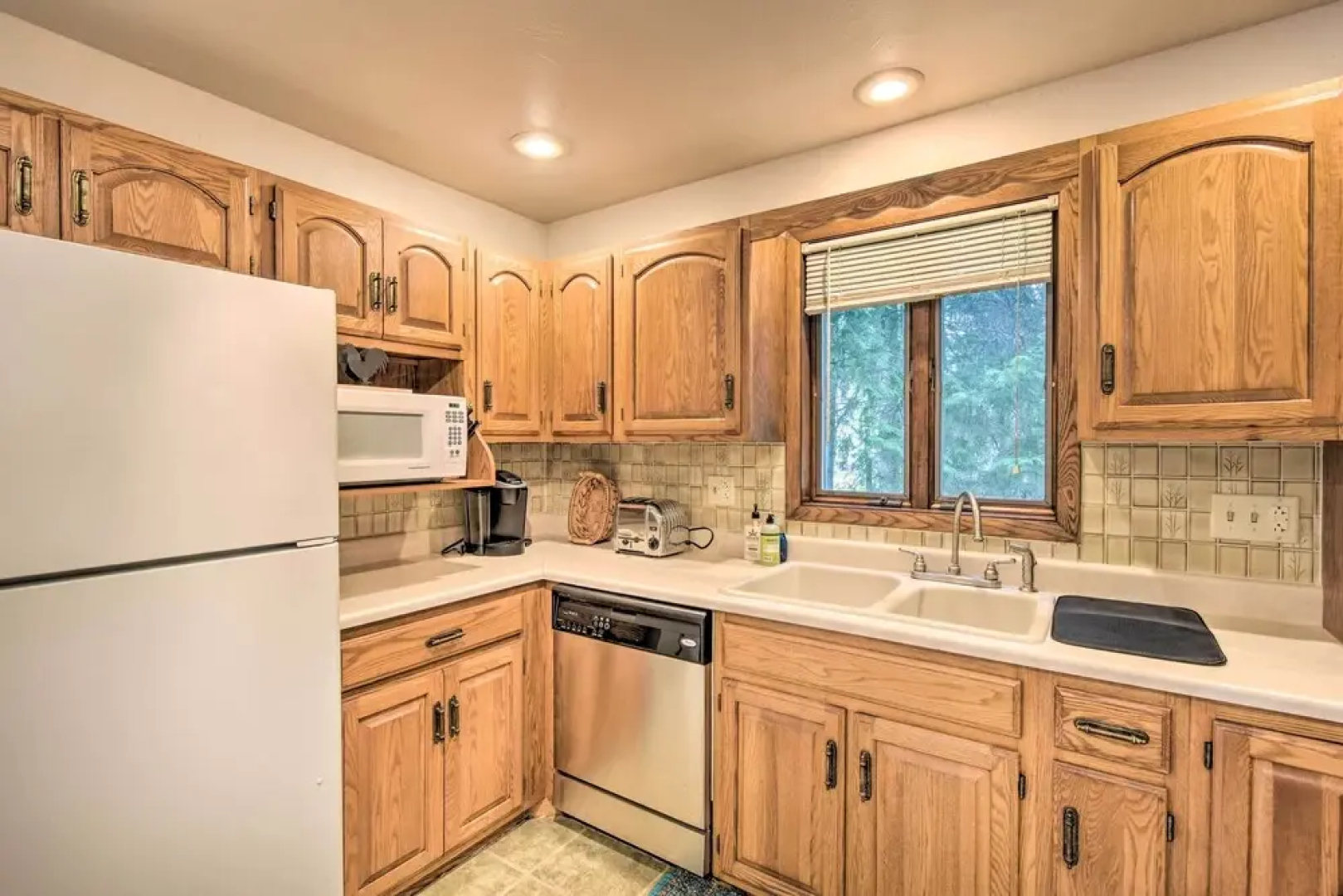 Walkable Lake Elkhart Apt: Dine, Shop, Swim!