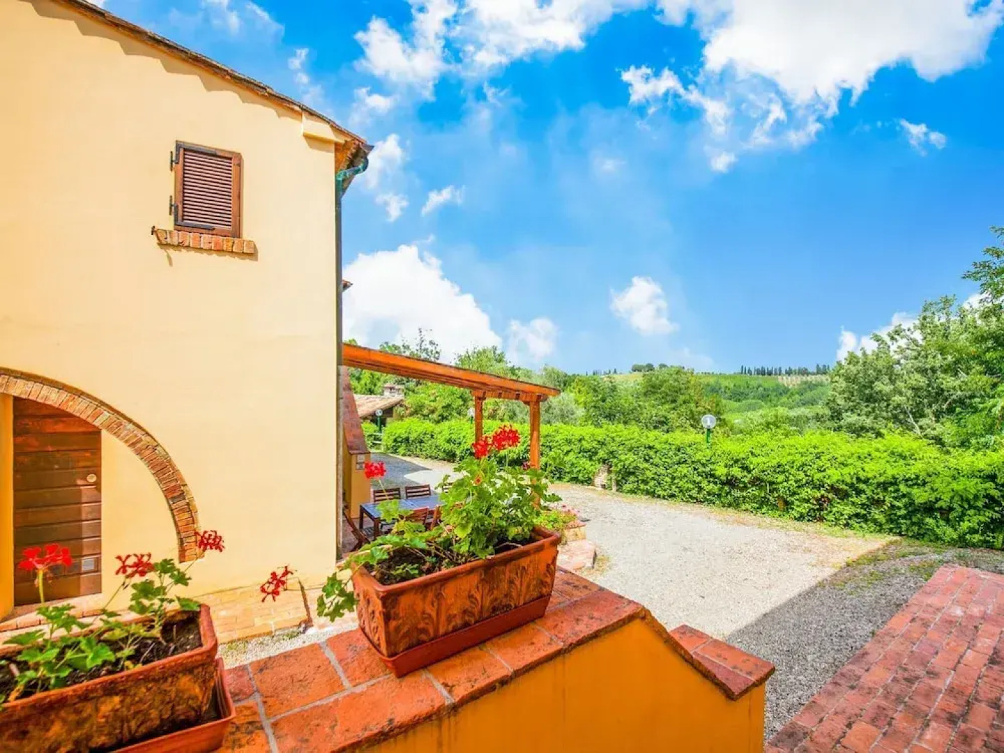 small village of beautiful apartments in the green Tuscan hills and olive groves