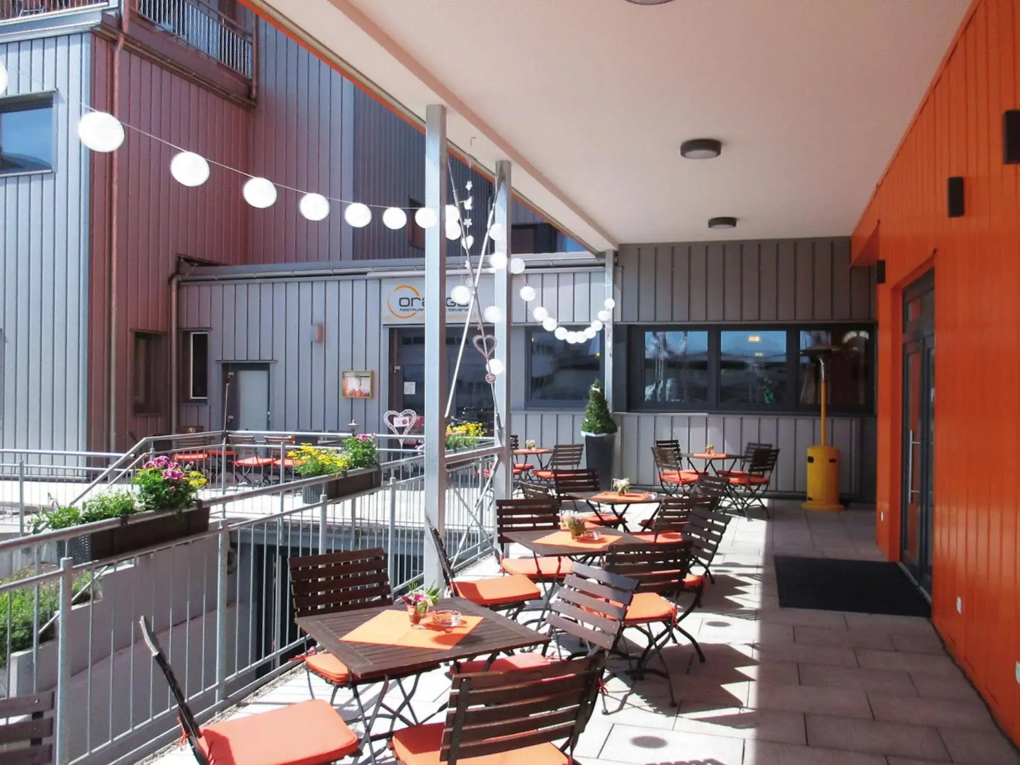 Orange Hotel und Apartments