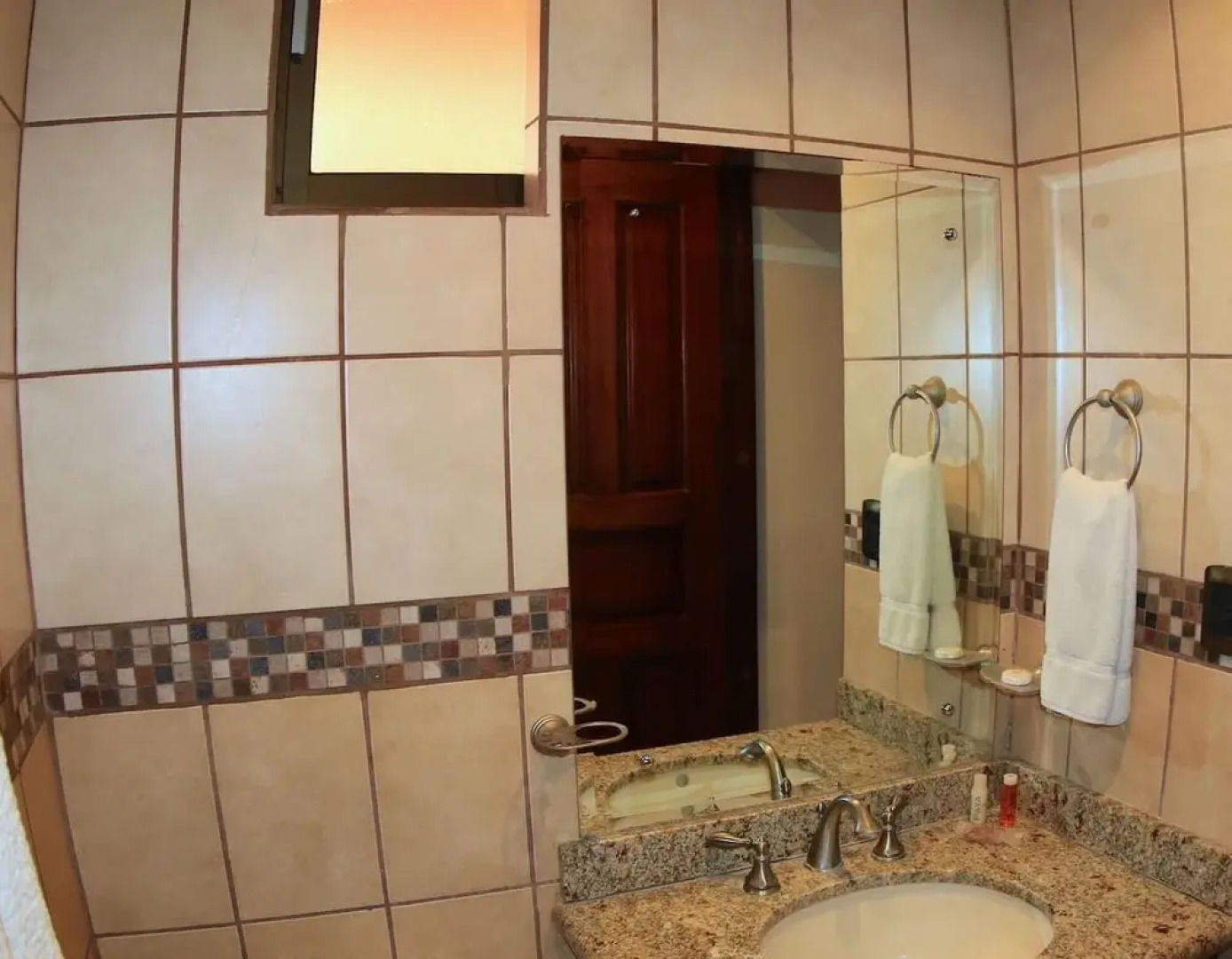 Hotel room-style ocean-view unit in Flamingo with pool