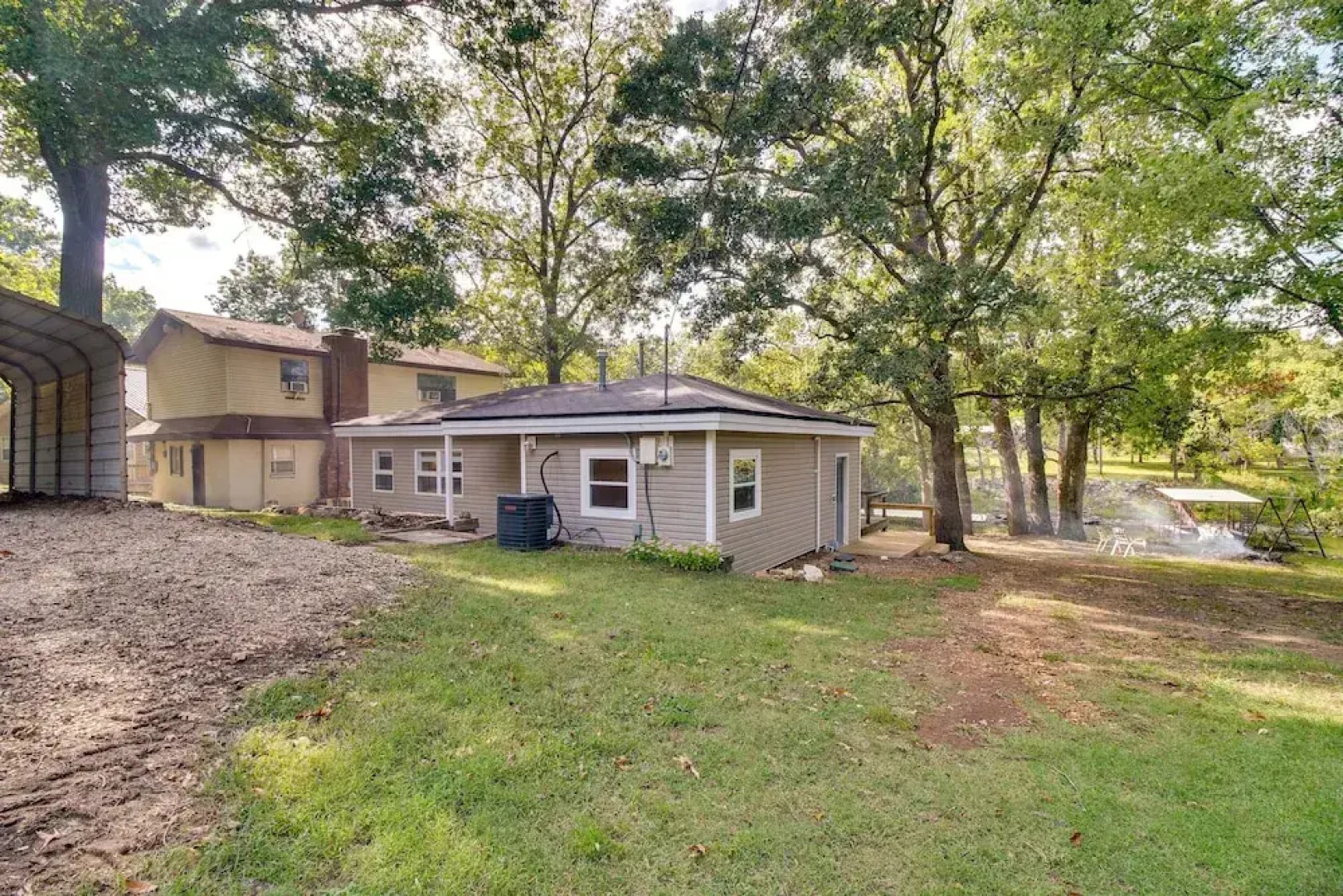 Deck + Dock Access: Lakefront Grove Cabin!