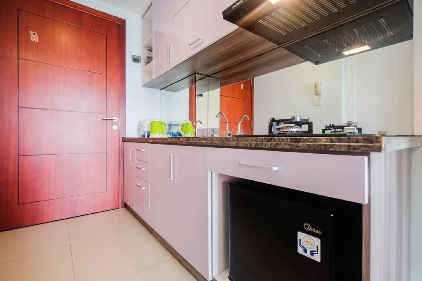 Minimalist Tamansari Mahogany Studio Apartment with City View