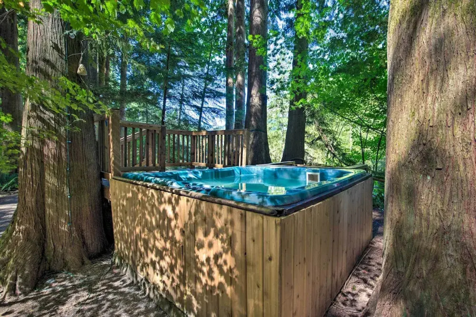 Three Enchanting Riverfront Cabins: Hot Tub Access