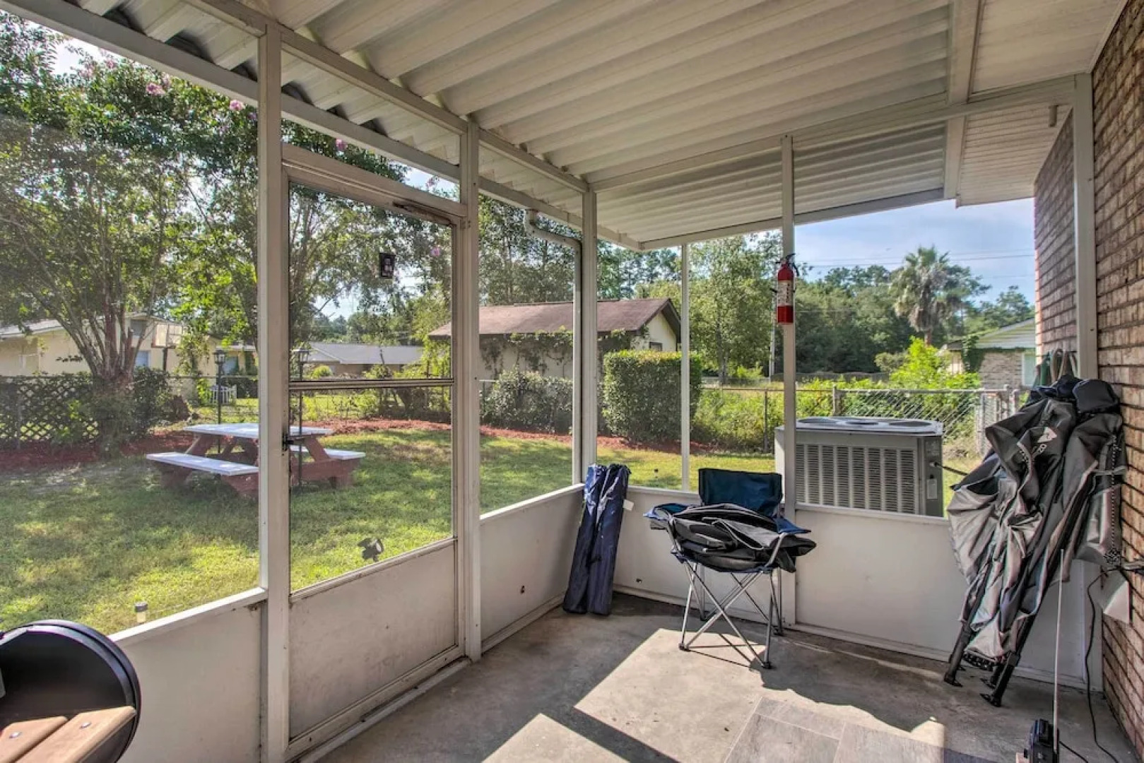 Cozy Waycross House w/ Yard & Screened Patio!
