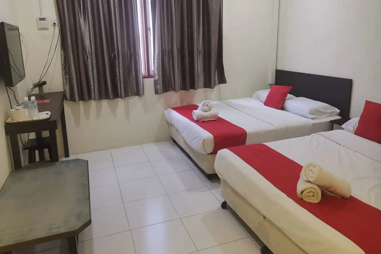 OYO 1104 Q Hotel