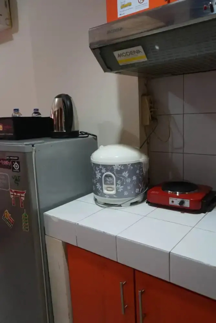 Comfy Studio Apartment at Margonda Residence 2 By Travelio