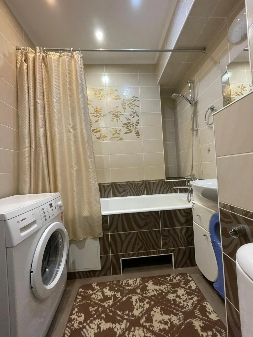 Апартаменты на проспекте Победы 5 корпус 2