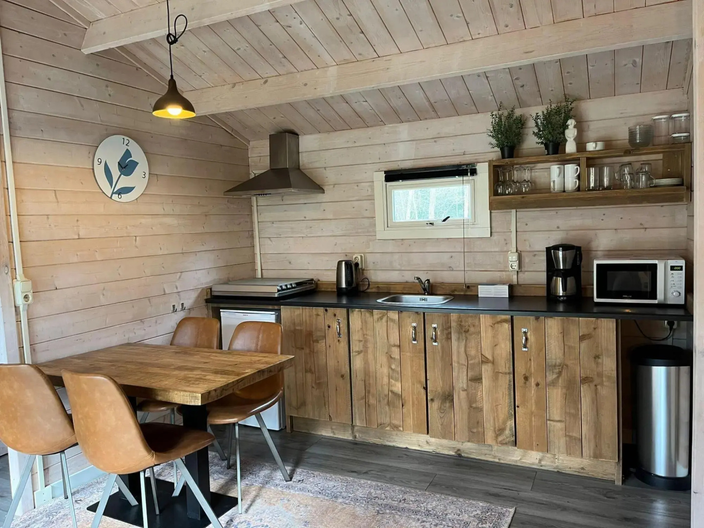 Wooden chalet with microwave, on a holiday park near three national parks