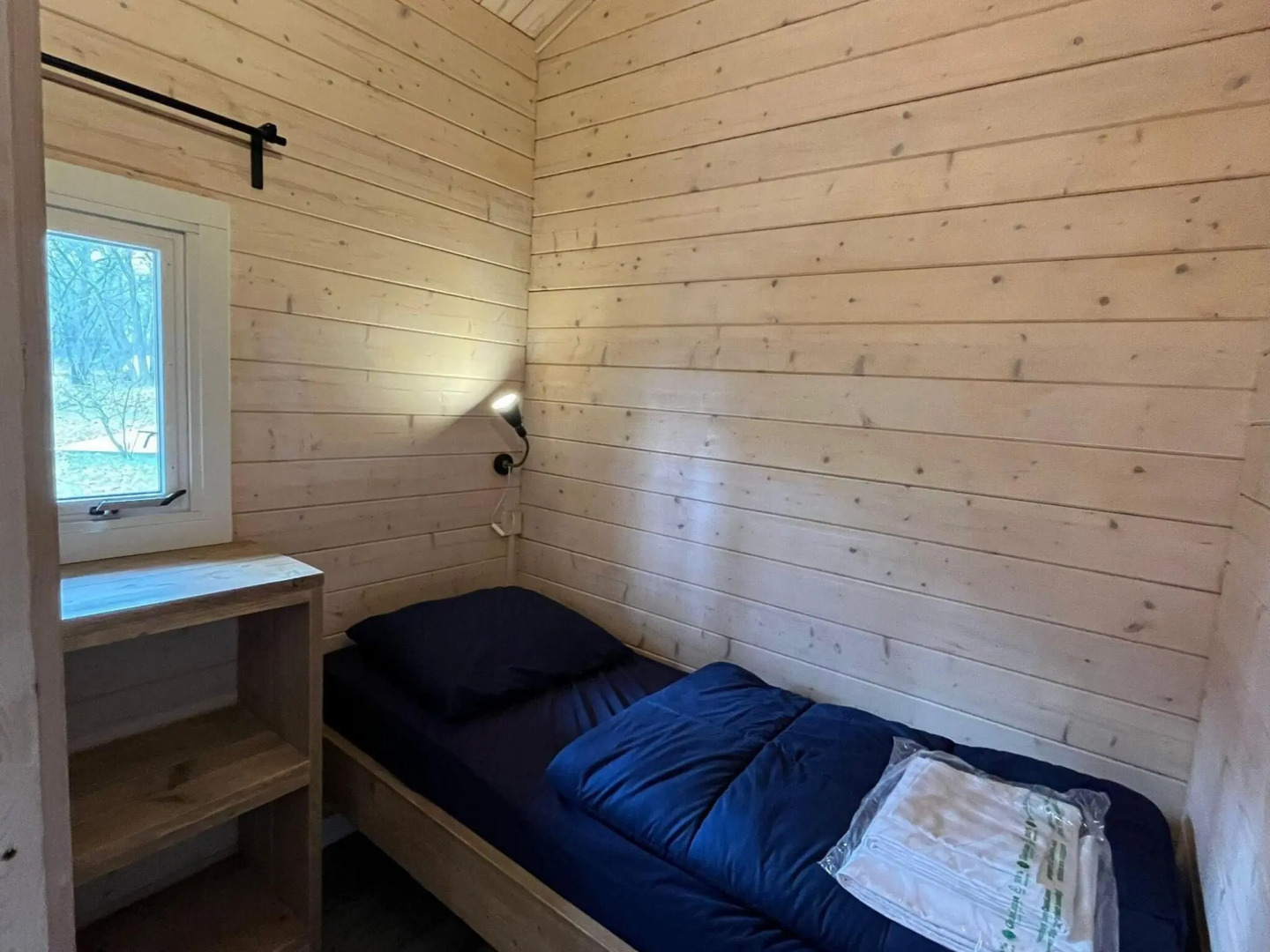 Wooden chalet with microwave, on a holiday park near three national parks