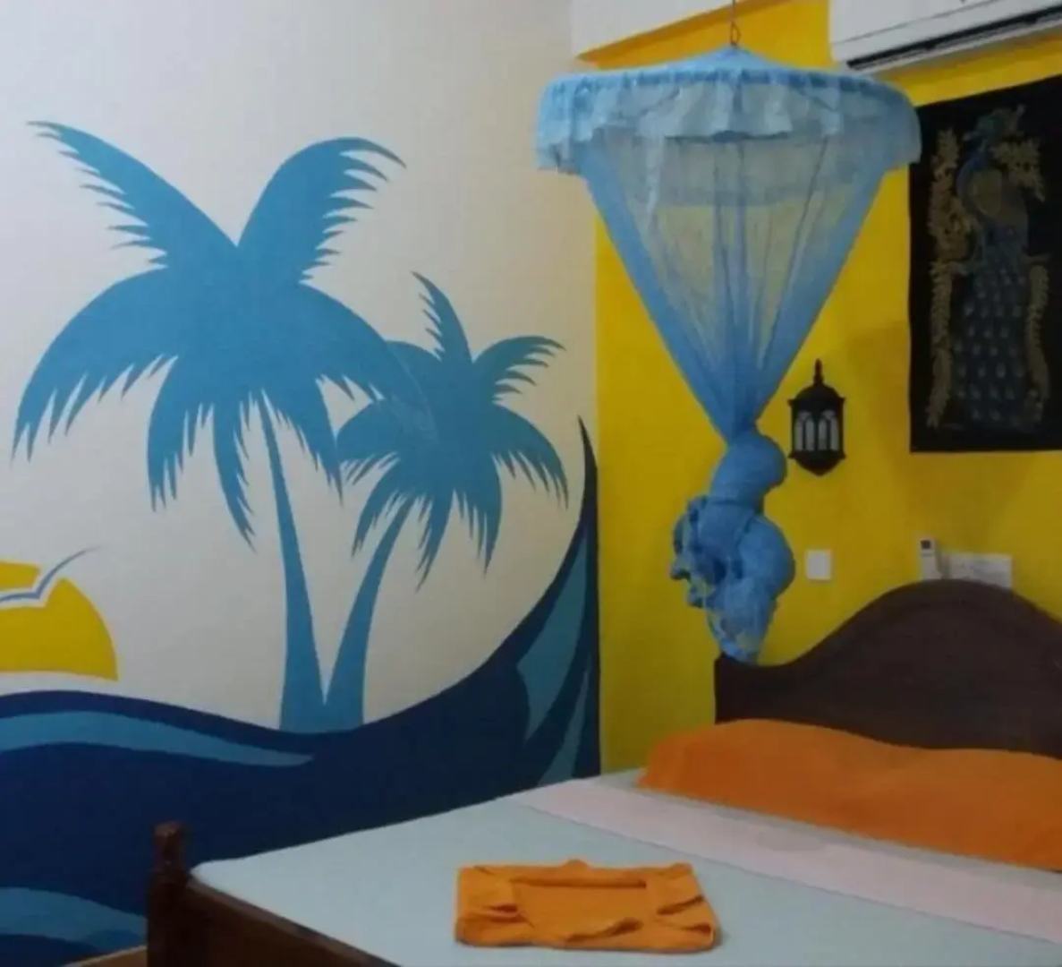 Malika's Yellow House