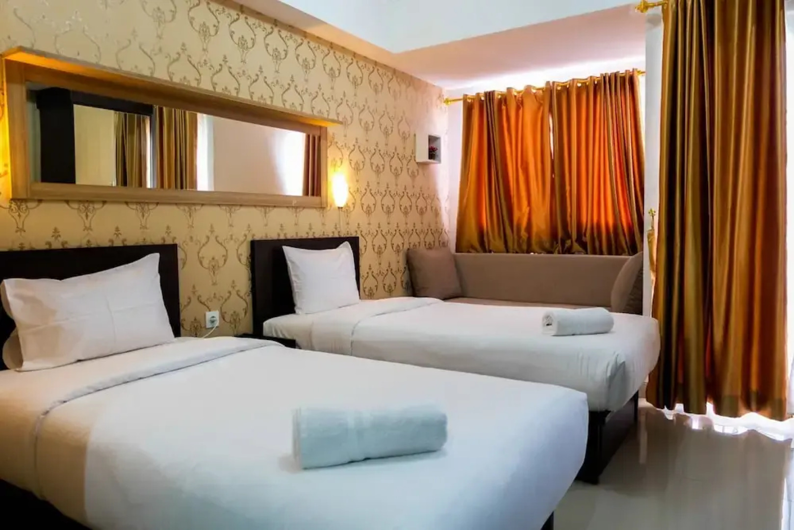 Minimalist and Comfy Studio The Oasis Cikarang Apartment By Travelio