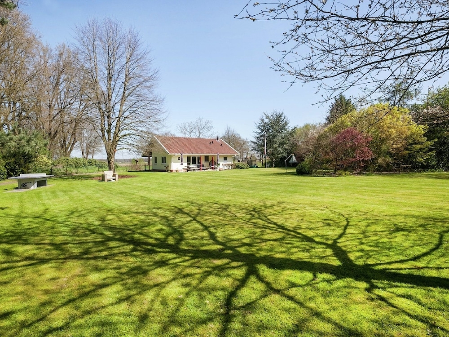 Detached house with large enclosed garden, playground equipment and covered terrace