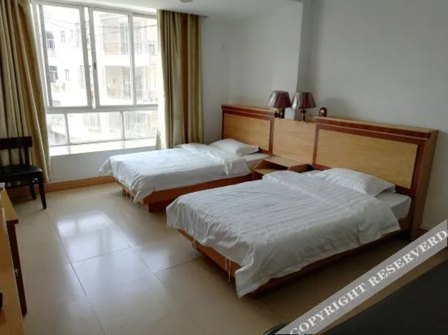 Longxing Business Hotel (Yangchun Railway Station Branch)