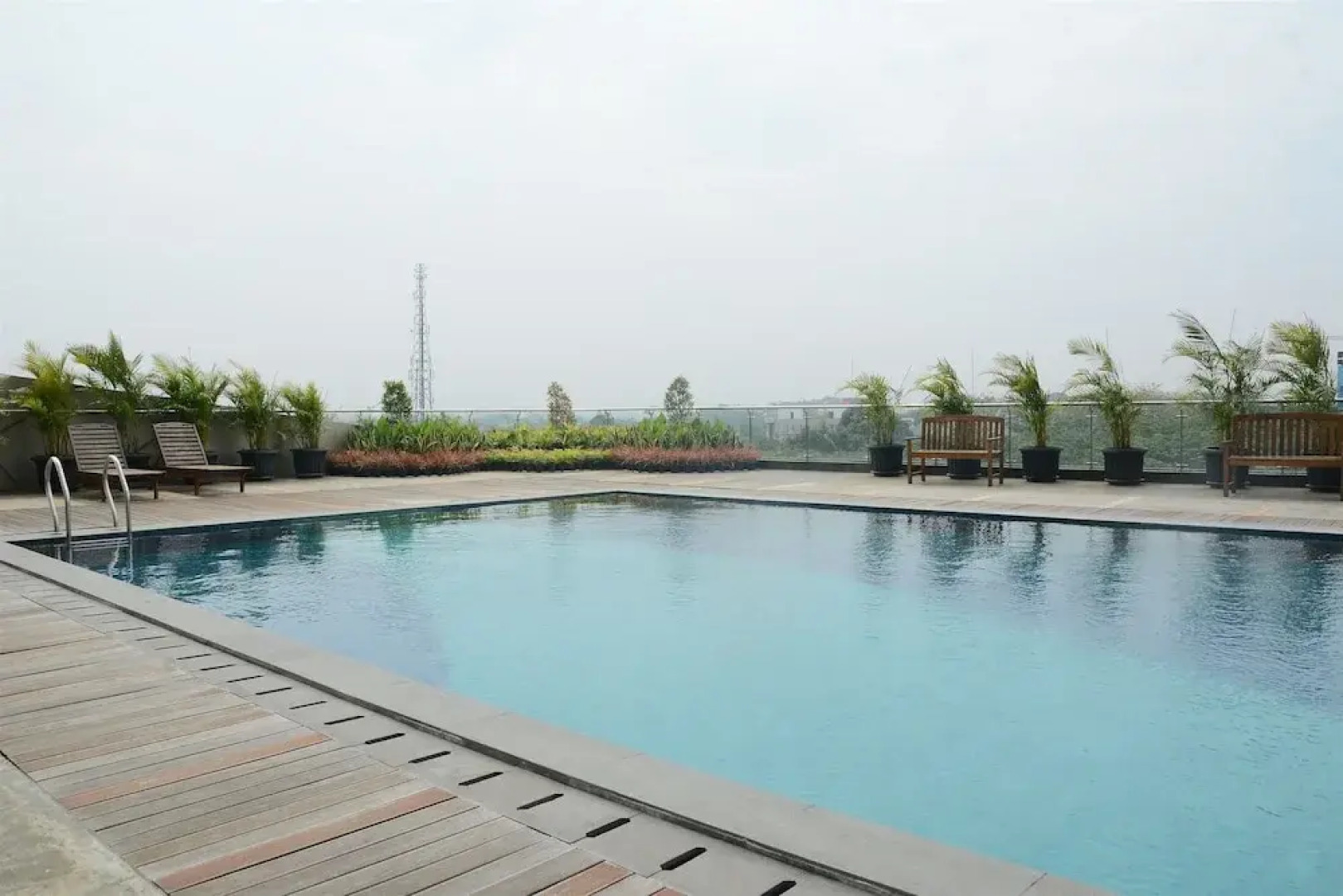 Classic Studio Tree Park Apartment near ICE BSD By Travelio