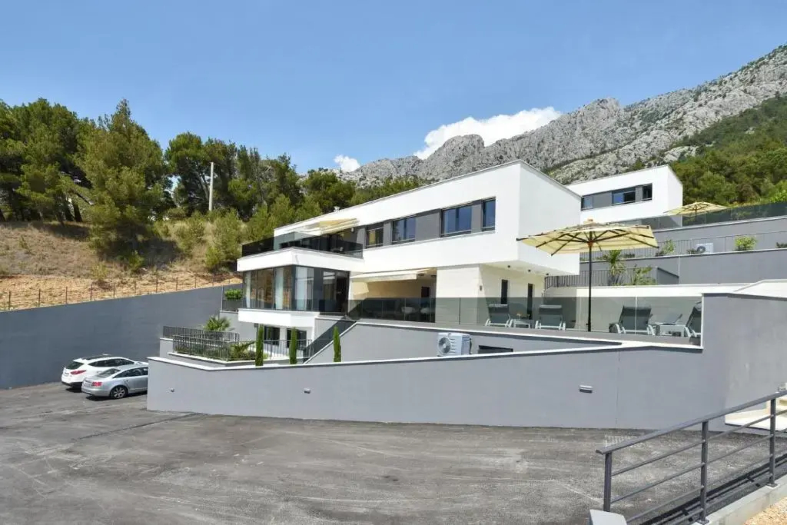 Luxury, seafront Villa Petra with heated pool only 50m from beach