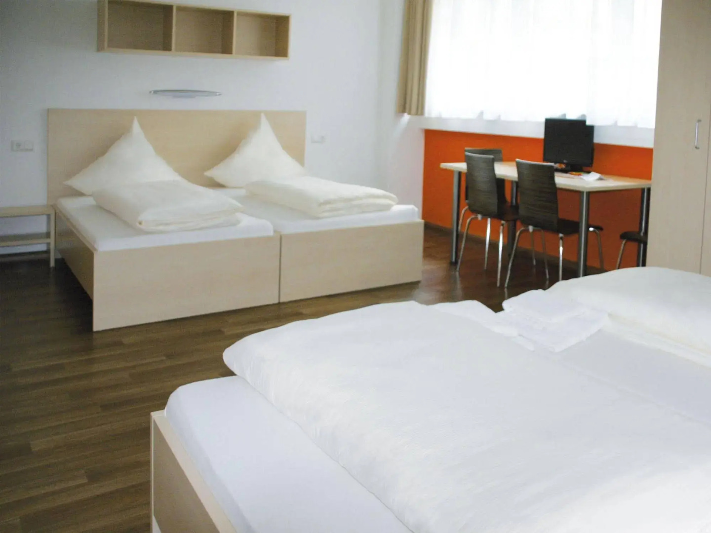 Orange Hotel und Apartments