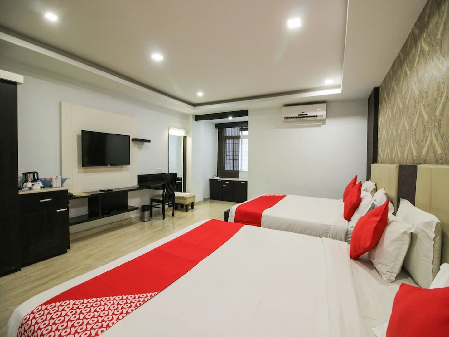 Capital O 15964 NI Ambaari Suites