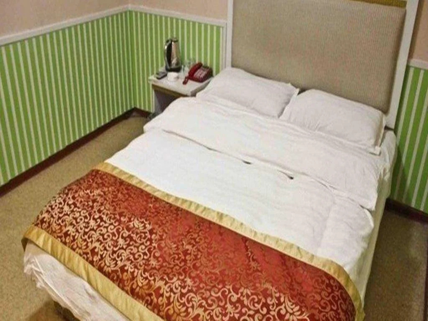 Tengzhou Nanhai Longgong Business Inn