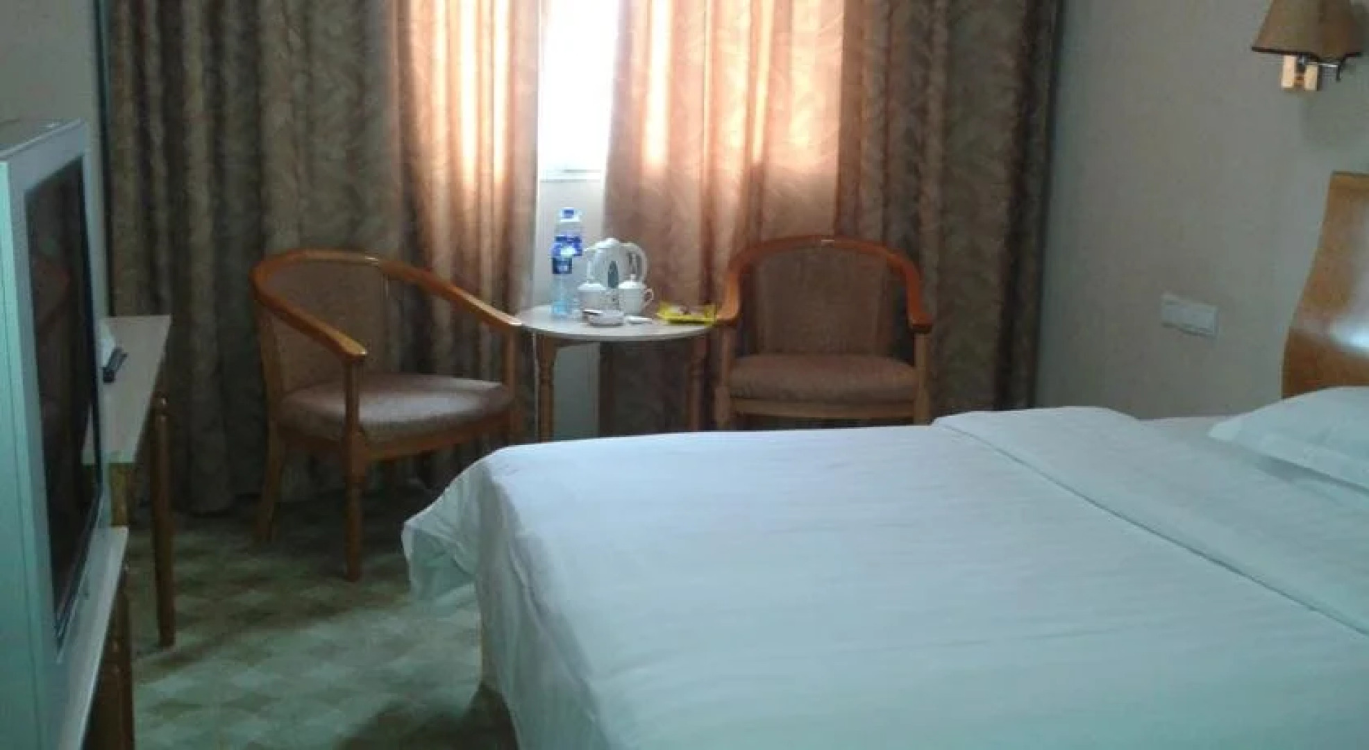 Super 8 Longyan Fa Zhan Plaza