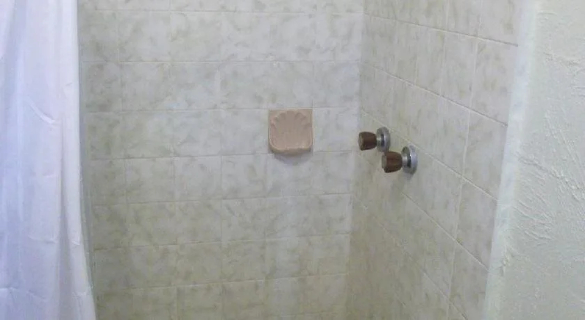 Kinka Palms Beachfront Apartments / Motel