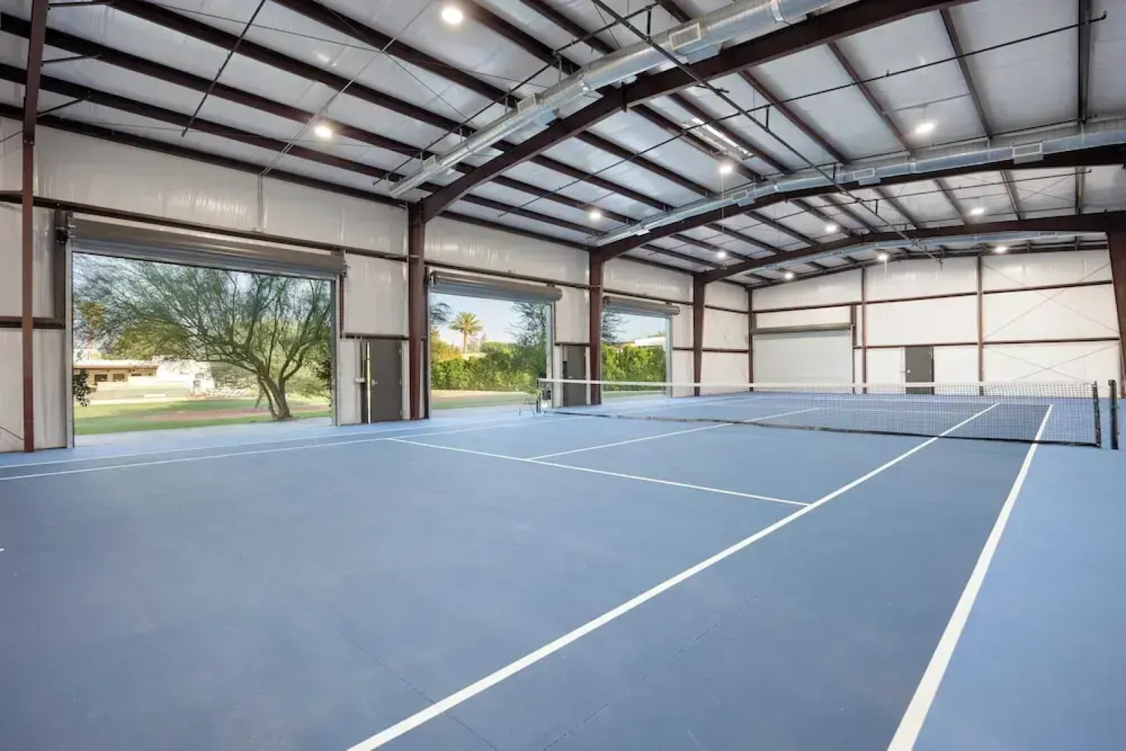 Sleeps 20! Architectural Mansion w/ Pool, Indoor Tennis Court, Game Room Starlight Estate by Avantstay