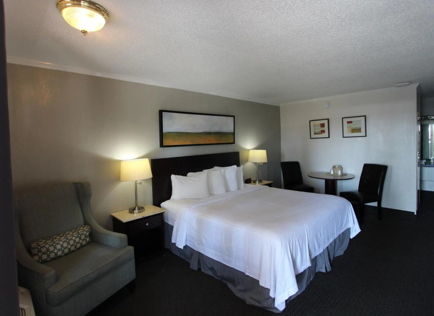 At Home Inn & Suites