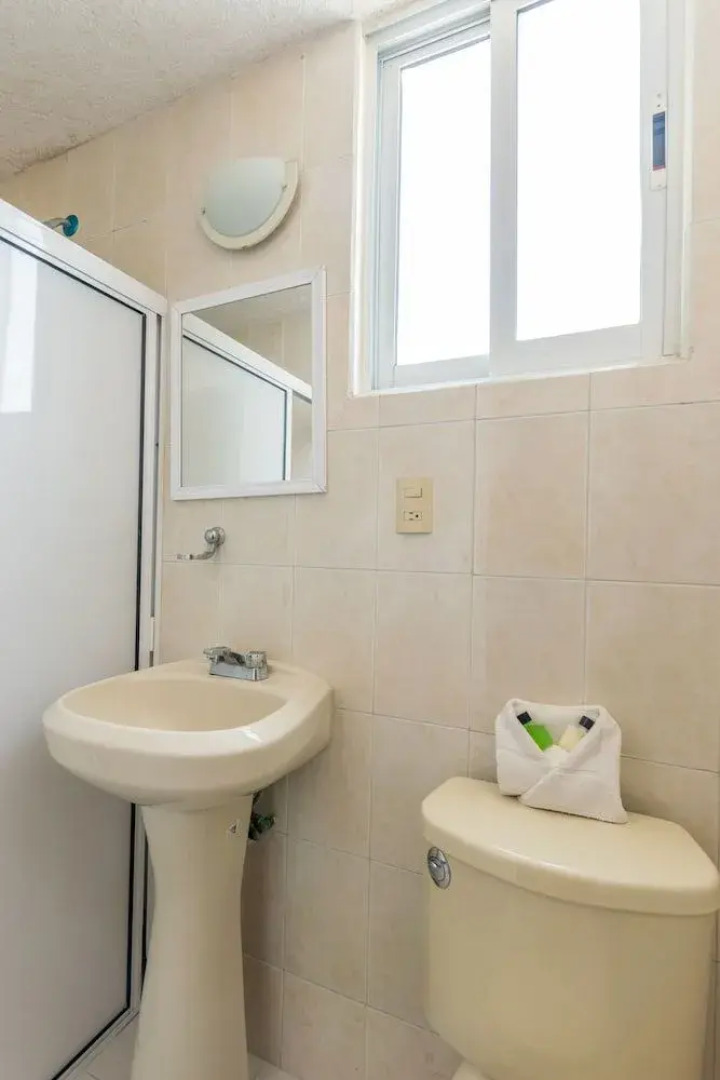 Suites Poliforum Inn