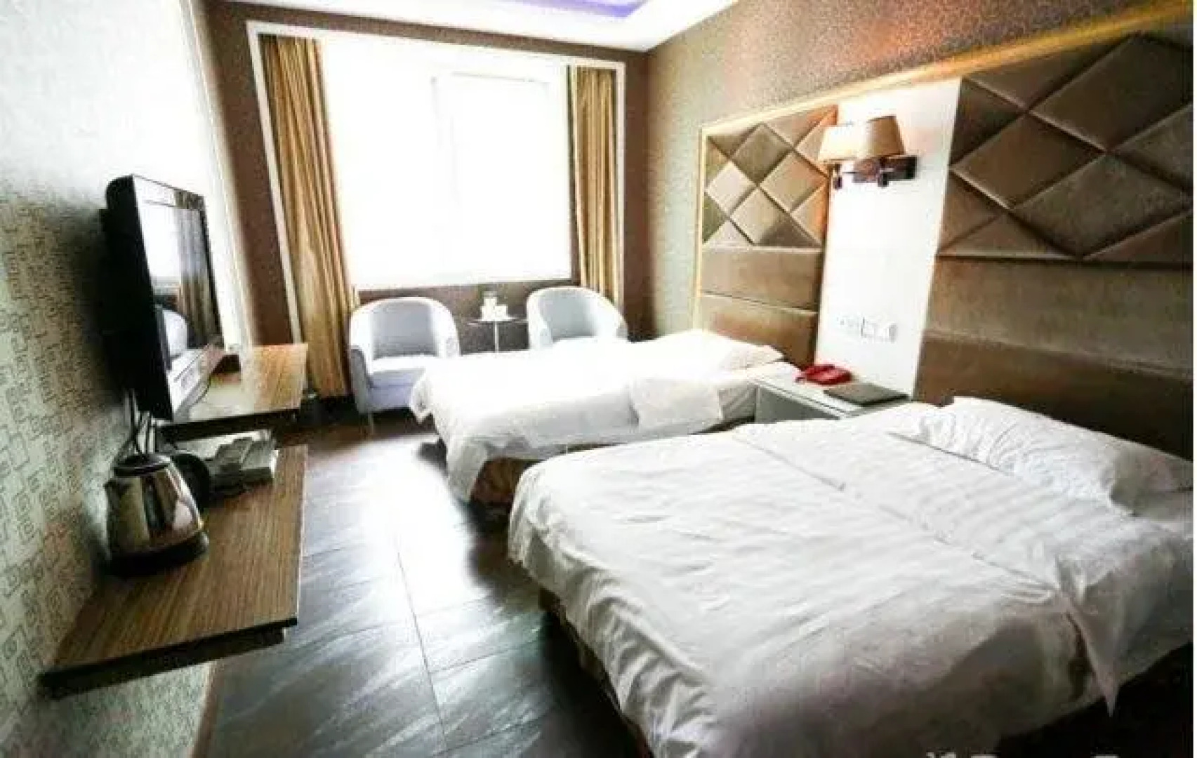 Yanting Jinxin Business Hotel