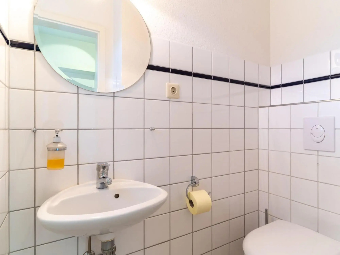 Holiday apartment with a fireplace in a thatched apartment house