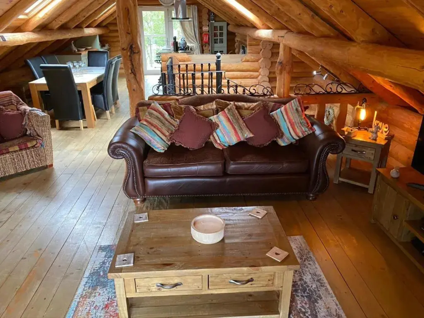 Woodpecker Log Cabin with hot tub, pizza oven bbq entertainment area, lakeside with private fishing peg situated at Tattershall Lakes