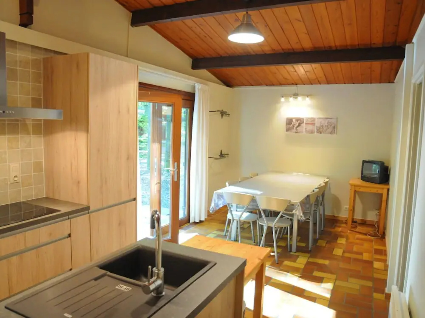 Wooden Chalet With Stove and Microwave Located in the Forest