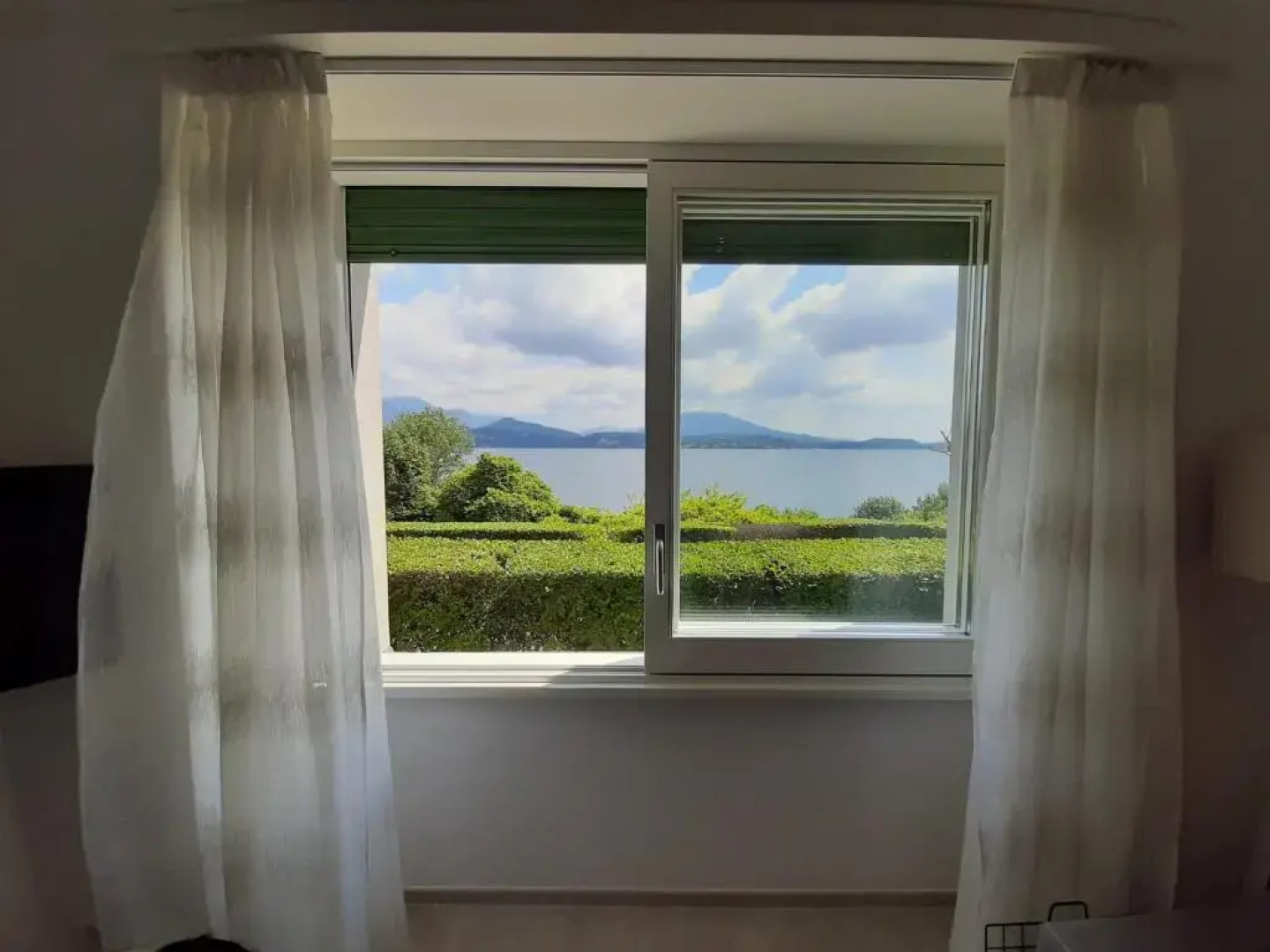 Appartamento GIOIOSA 2 con giardino e vista Lago Maggiore