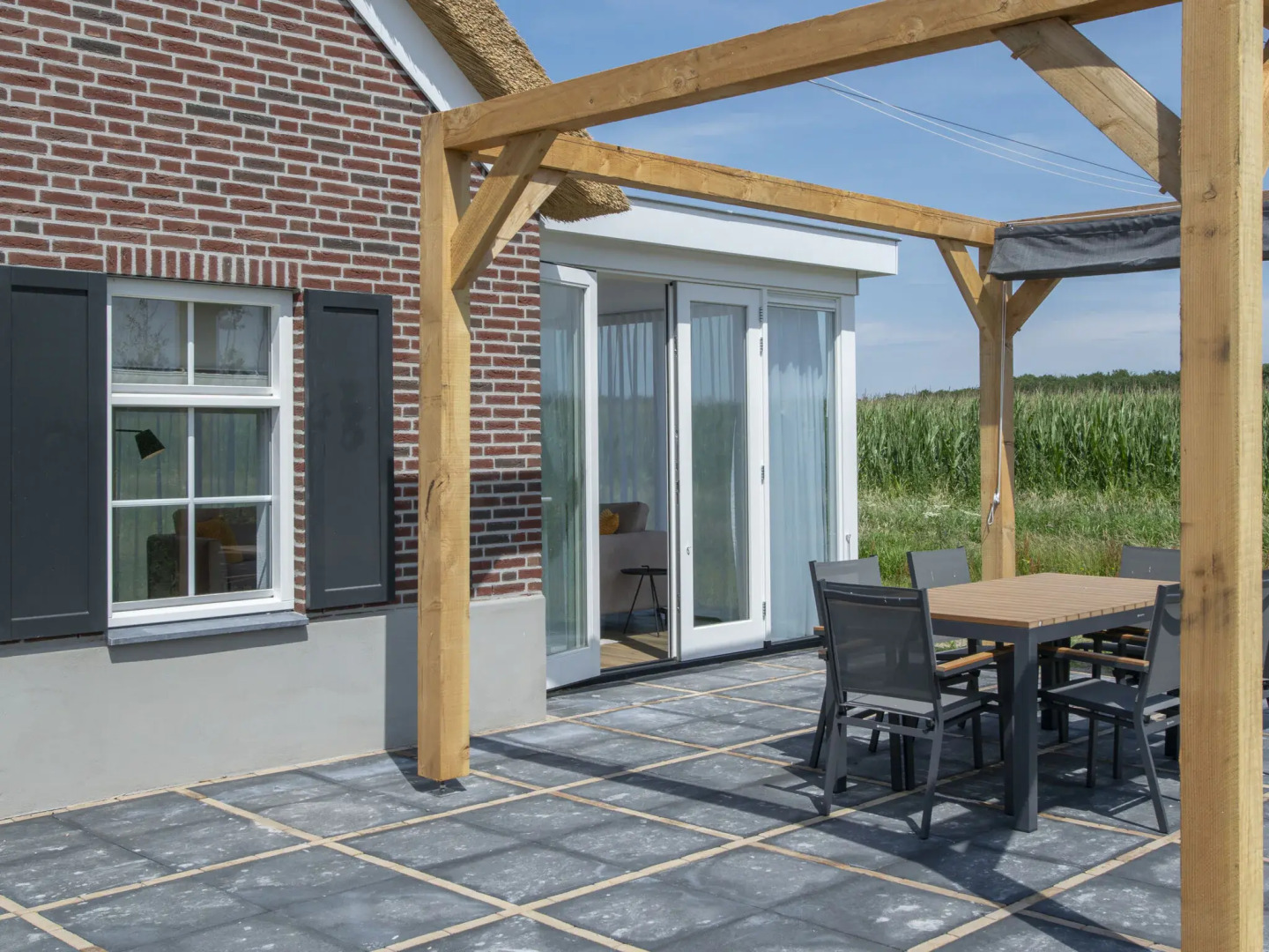 Thatched villa with two bathrooms, on a holiday park surrounded by nature