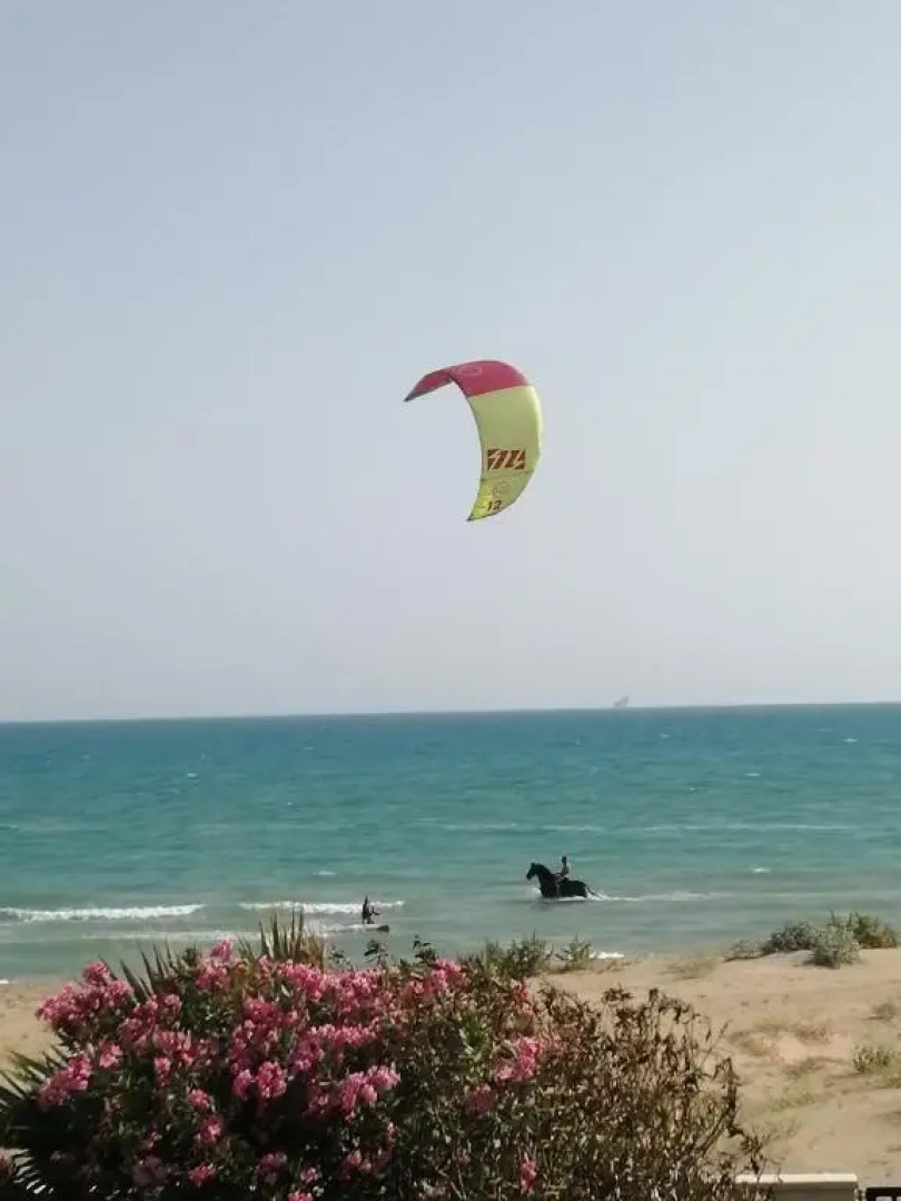 Appartamento con giardino con accesso a mare