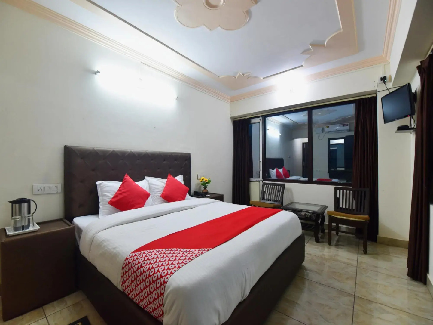 OYO 28555 Sandalee Comforts