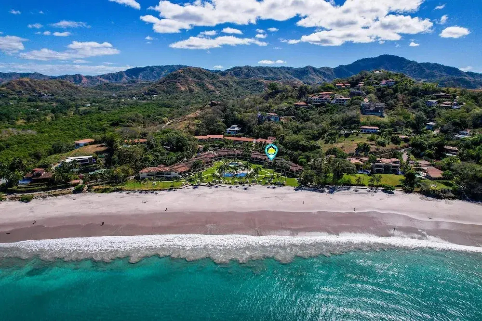 Luxury Beachfront Condo w/ High-End Wood Furnishings and Ocean Views in Exclusive Community