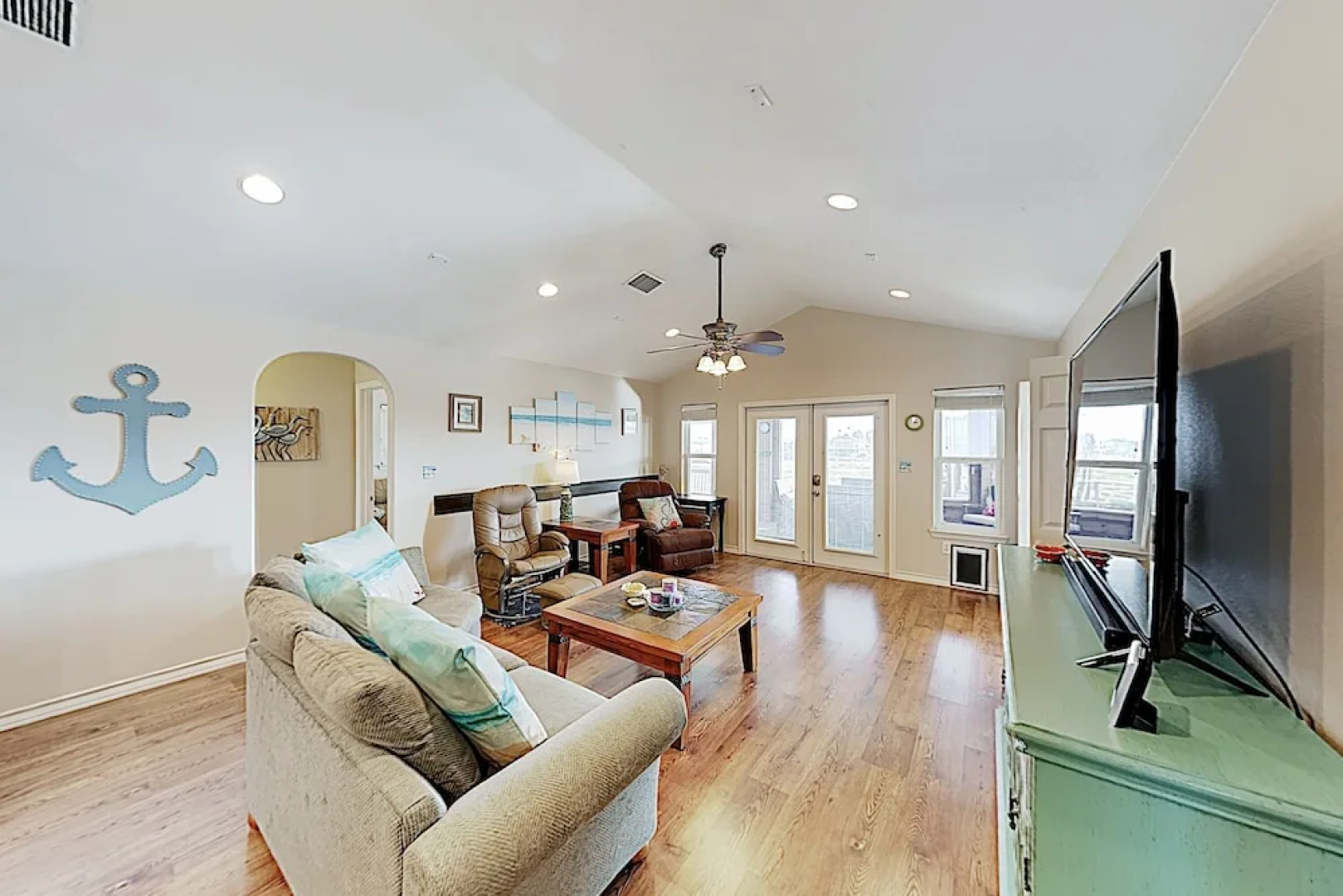 Canal-front Getaway W/ Enclosed Deck & Boat Dock 4 Bedroom Home