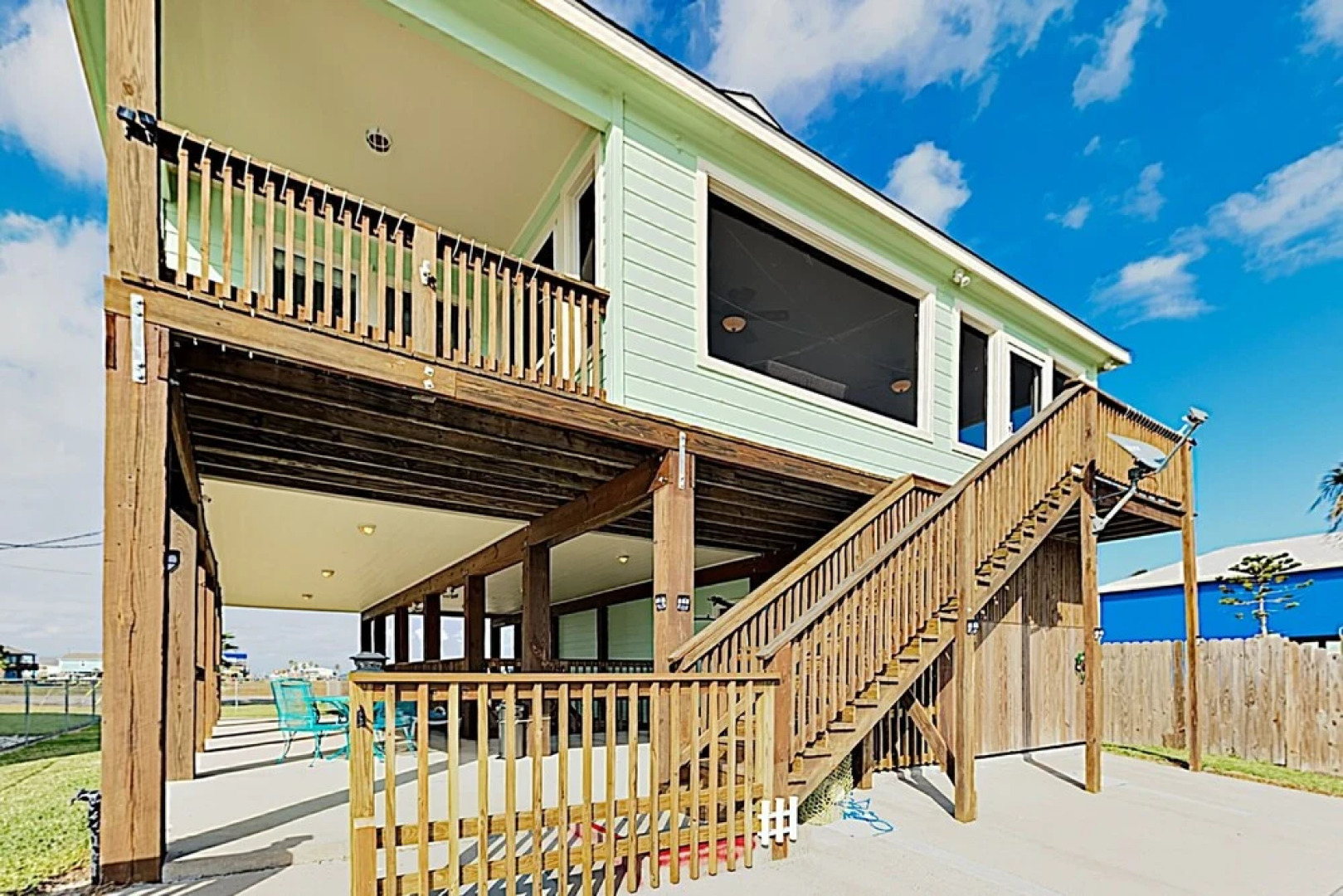 Canal-front Getaway W/ Enclosed Deck & Boat Dock 4 Bedroom Home