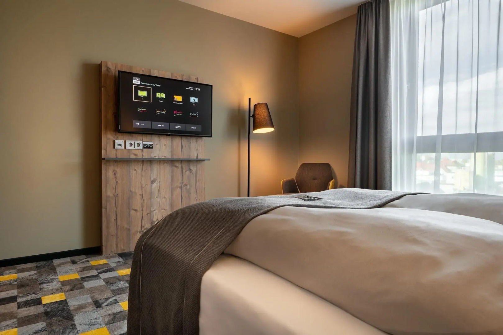 Отель Holiday Inn - the niu, Timber Esslingen, an IHG Hotel