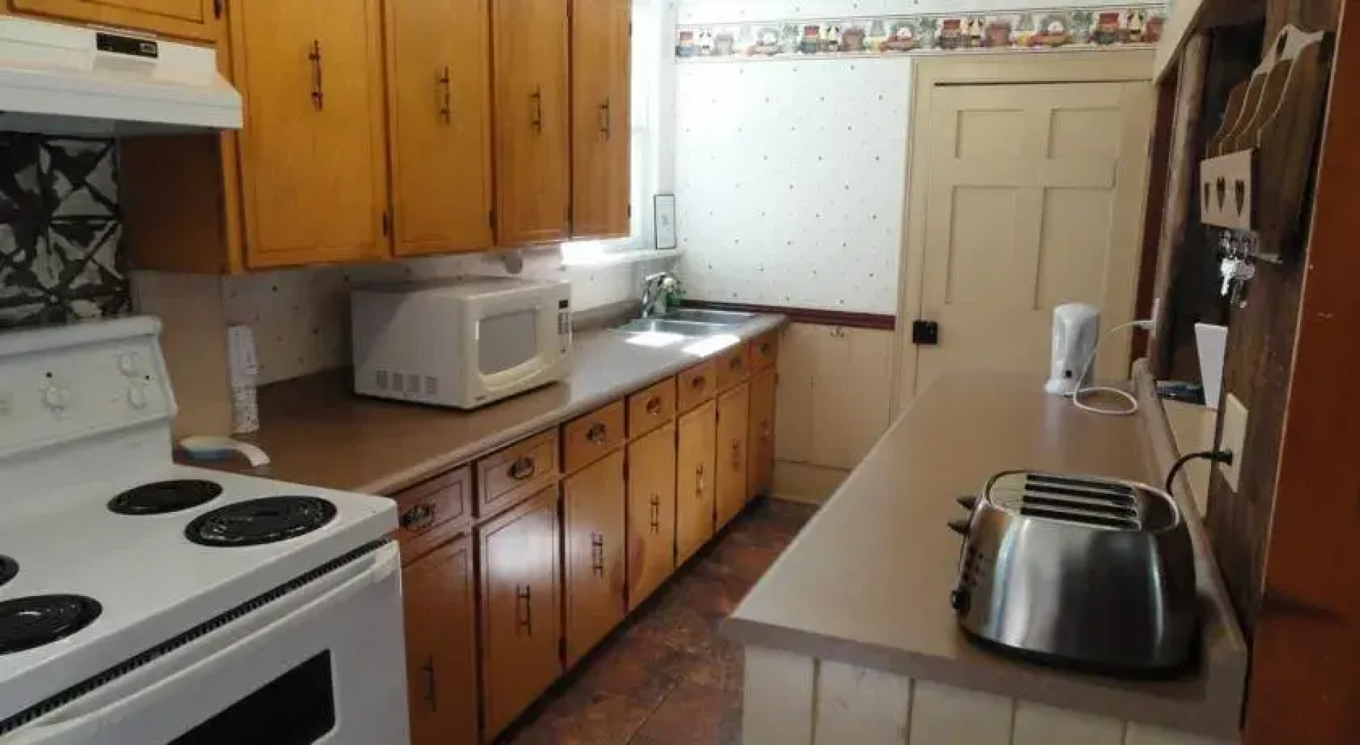 The Maple House by the Sandbanks