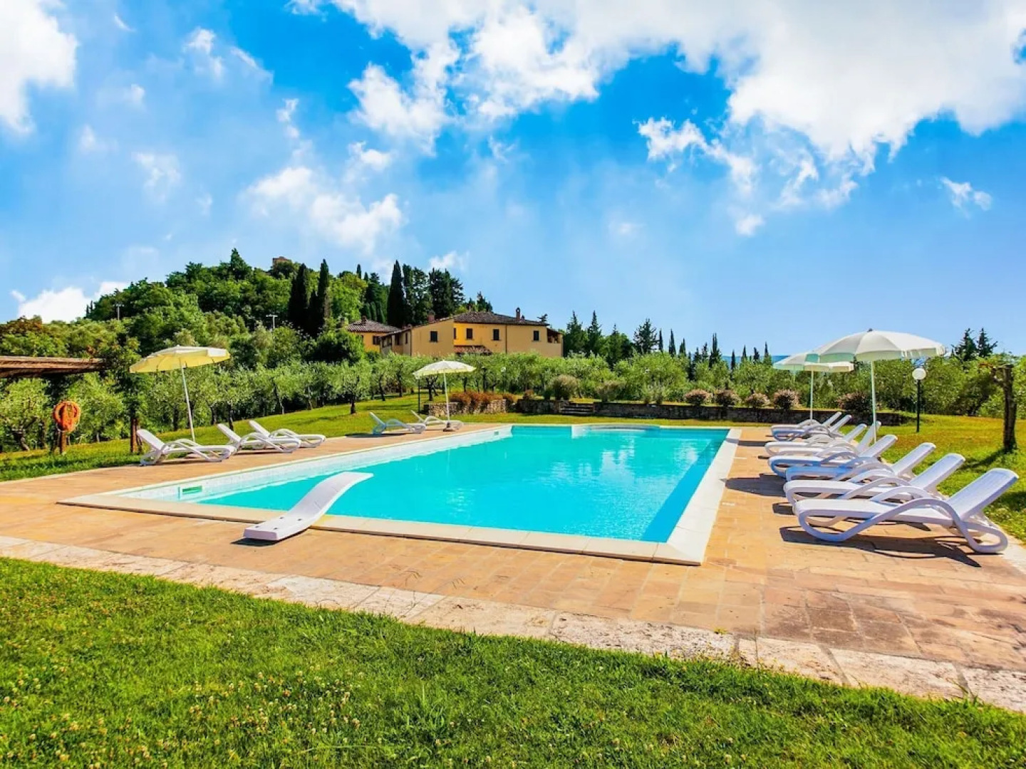 small village of beautiful apartments in the green Tuscan hills and olive groves