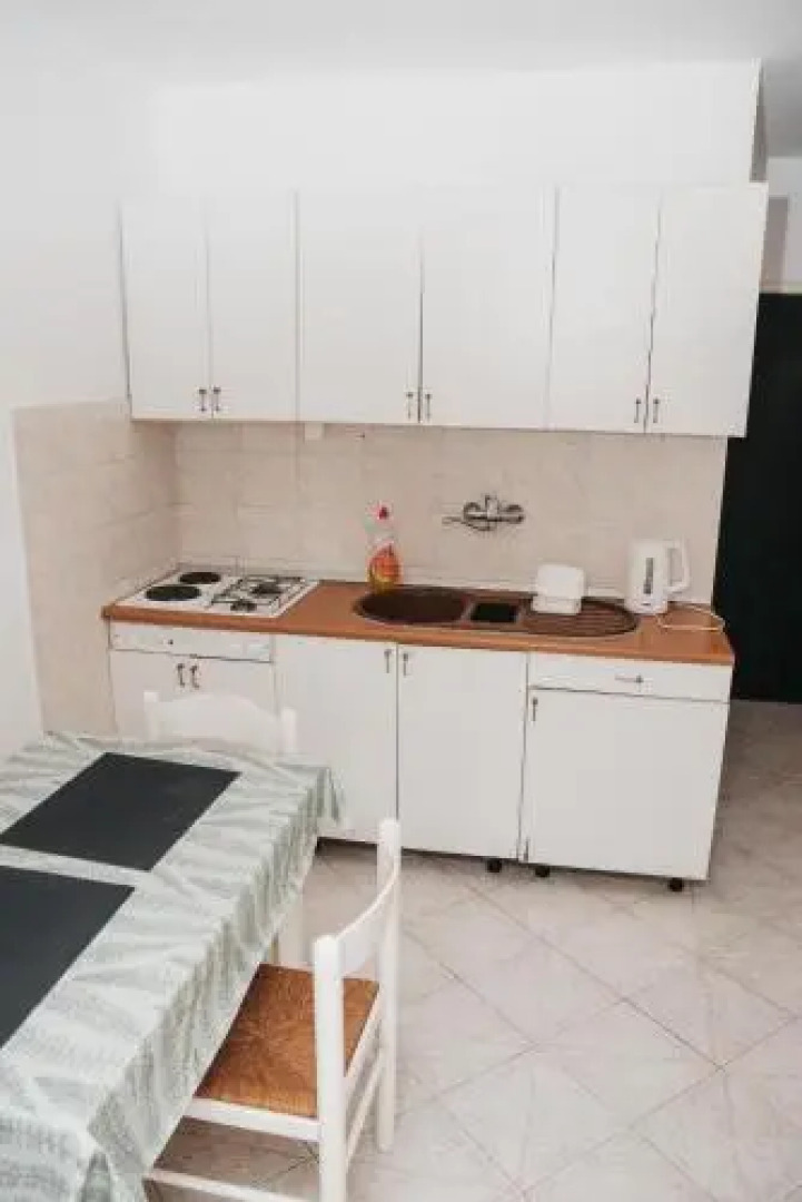 Apartments and Rooms Maganic