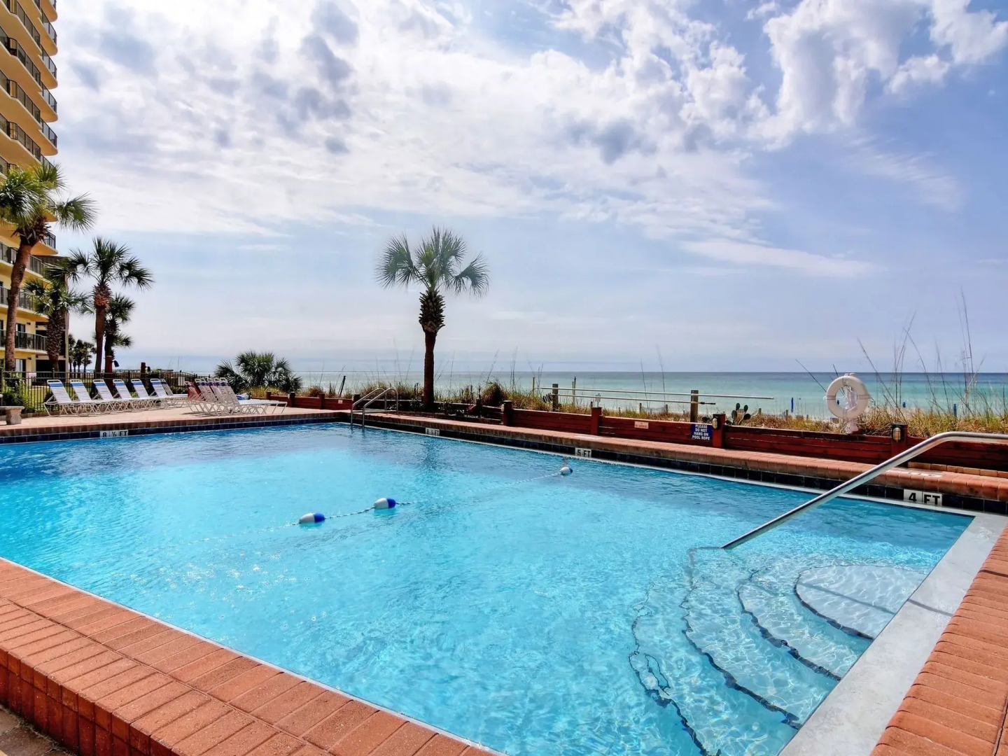 Commodore 107 1st Floor Walk Out to the Beach from Your Patio by RedAw