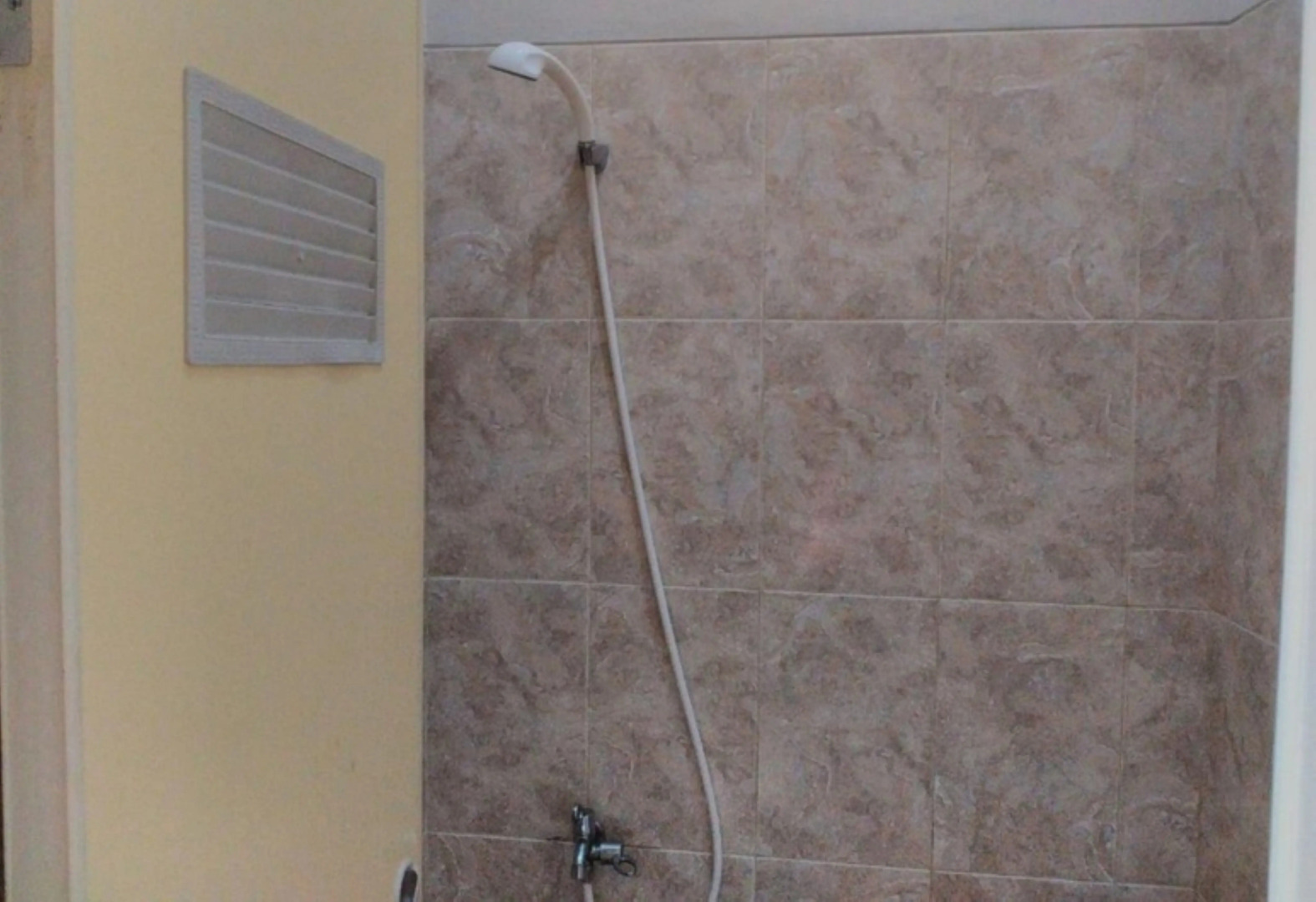 Nabila Syar i Guesthouse by ZUZU