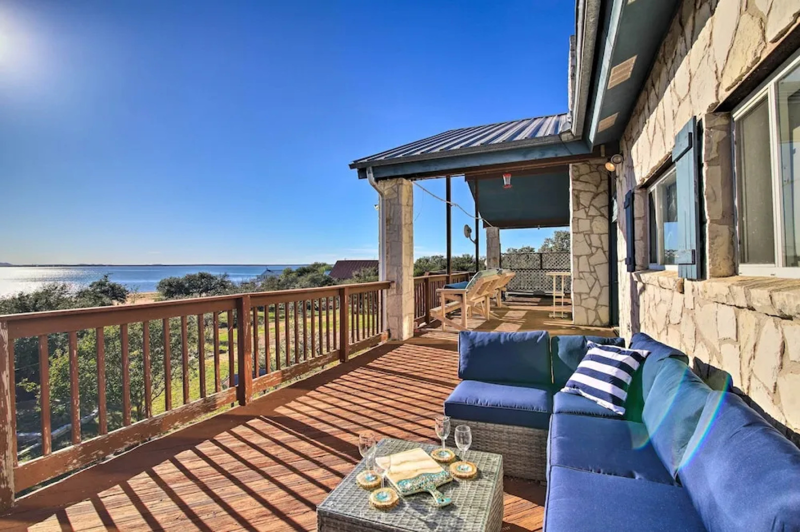 Sunny Lakefront Escape w/ Private Beach & Deck